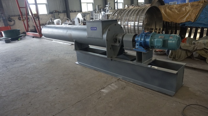 Fully automatic block making machine in operation — finished bricks neatly stacked demonstrating production output