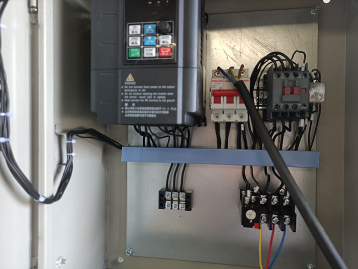 Open-architecture PLC control system with Ethernet/IP communication for industrial conveyor automation.